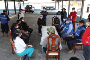 Firma de convenio ACDC y comerciantes calle Loja
